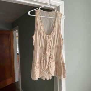 Cream colored vest ruffled